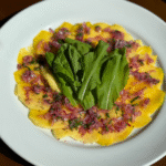 Carpaccio de manga com mix de folhas (R$47,00)