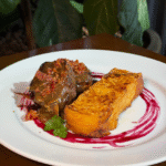 Medalhão de filé mignon com presunto parma (R$ 84,00)